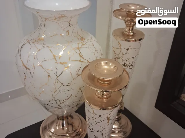 مزهرية و  مكان شموع