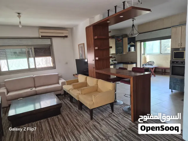 شقه رائعه بغرفتين نوم وسط البلد الشرفه