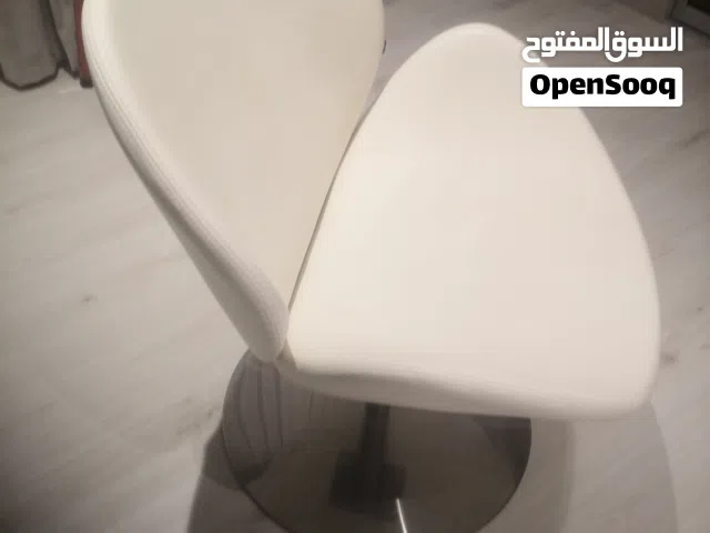 كرسي جلد دوار