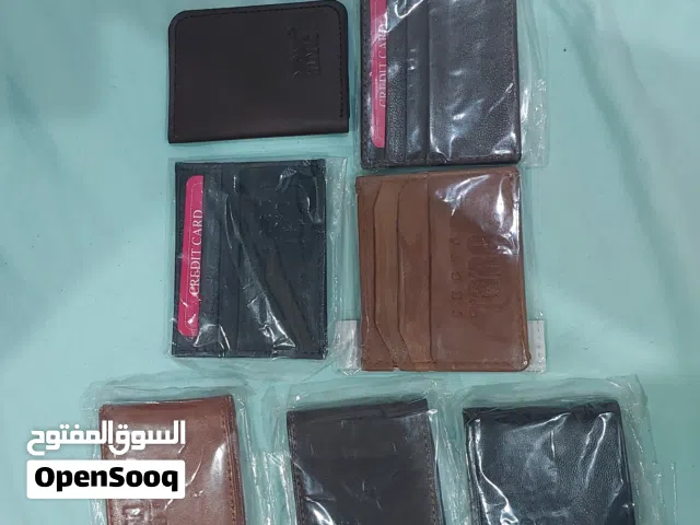 مجموعة محافظ متنوعة جلد طبيعي