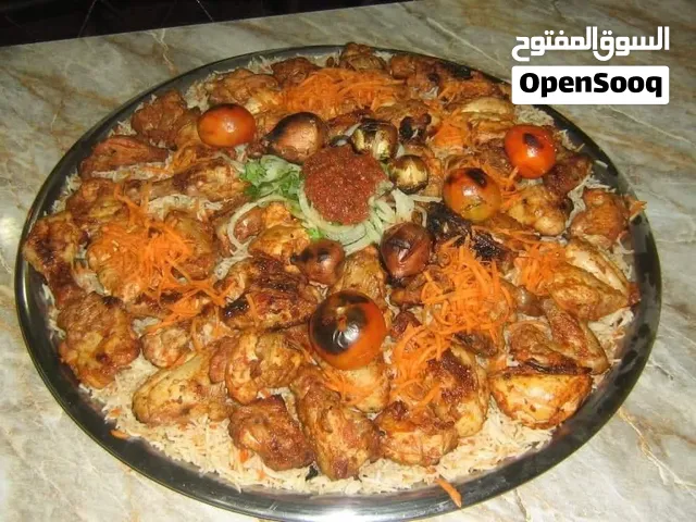 مطعم قدر ونار للدجاج التركي والرز البخاري