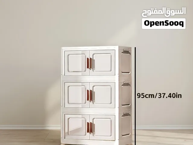 This 3-tier collapsible cream-white plastic storage cabinet features.