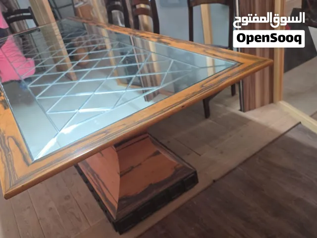 طاولة سفرة فاخرة وأنيقة من الخشب والزجاج المشغول