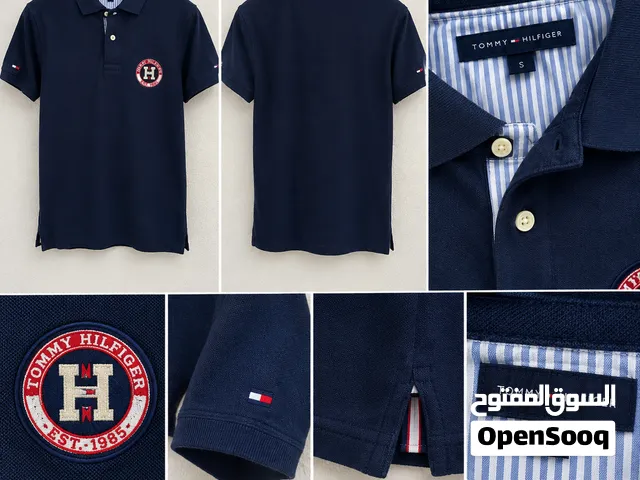 قميص كحلي أنيق من TOMMY HILFIGER، تصميم كلاسيكي ومرتب مناسب للّبس اليومي والمناسبات، بلون كحلي سهل ا