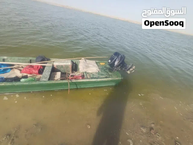 زورق  فيبر طول 6 متر عرض 150 مع مكينه 18 توهاتسو بلم نظيف و خفيف جدا . بصره . شط العرب