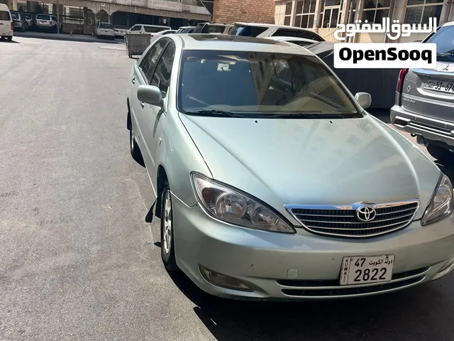 تويوتا كامري 2004 GLX خليجية، صالة سيدان، لون أخضر، أوتوماتيك، حالة جيدة
