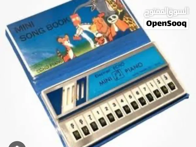 Vintage 1980s Electronic Pocket Piano – ML-02  Collector’s Item