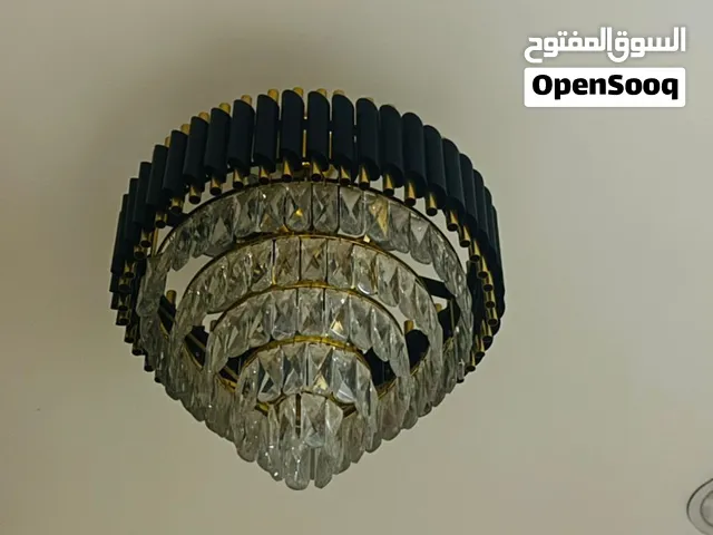 ثريات ذهبي باسود ب زجاج اسطواني