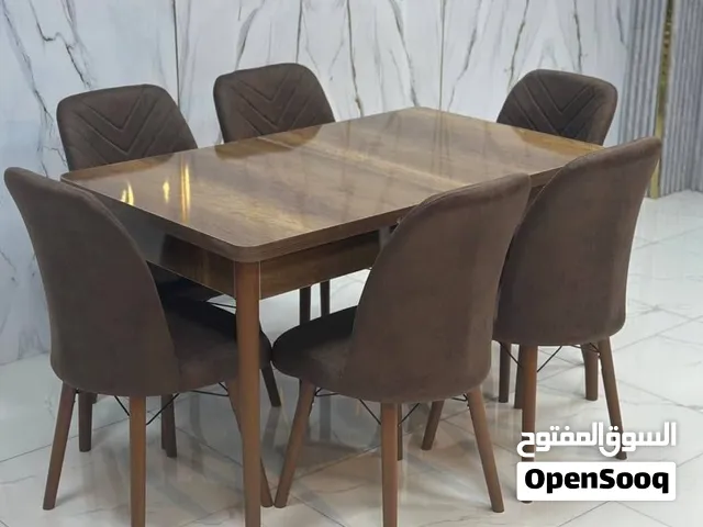 ميز طعام 6 كرسي سلايد سطح خشب ارجل خشب   6 كرسي 240الف  4 كرسي 200الف