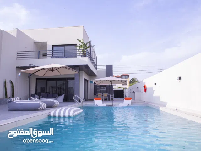 تجربة الفخامة والراحة : احجز شاليهك الآن واقضي اجازتك بكامل الخصوصية والرقي The gray villas