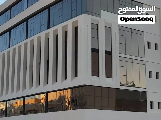مكتب تجاري راقٍ للإيجار - واجهة أمامية  بناية أمازون بزنس سنتر- شارع المها التجاري