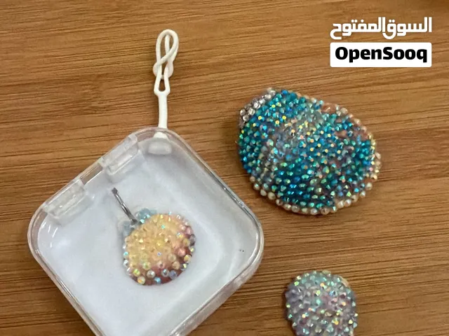 Hand made by emarati real seashells picked from the beach bedazzled for three days
