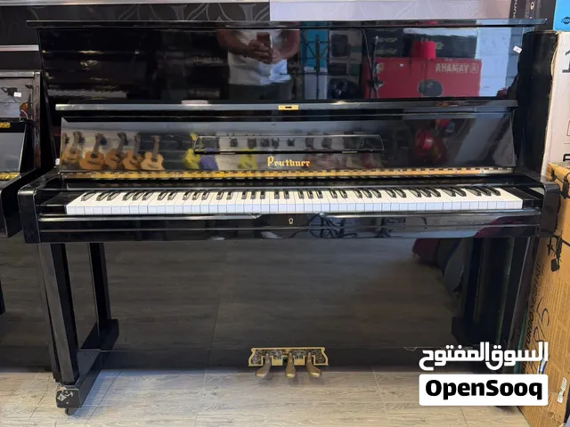 بيانو عمودي من ماركة Pruthner صناعة ياباني اصلي