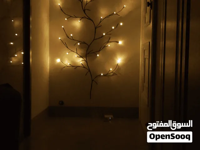 انارة جدارية بشكل شجرة
