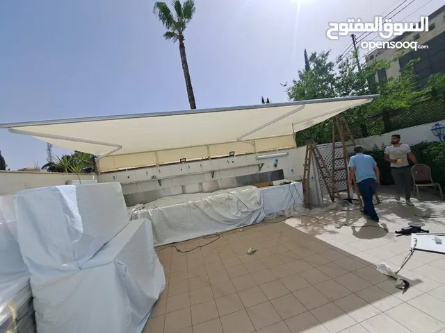 مظلة متحركة للمحلات او المنازل