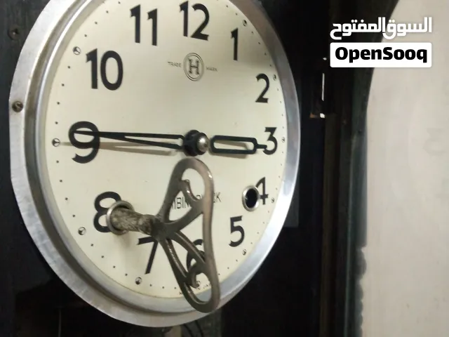 ساعه حائط خشبيه يابانيه بالزمبلك