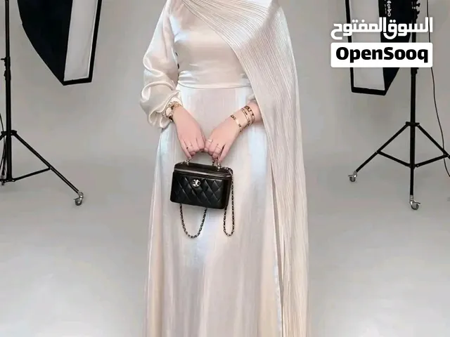 فستان اورجانزا سواريه بشال طويل