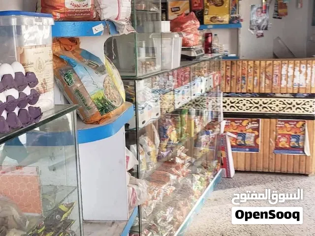 عرطة العرطات في شملان بقالة ركنية (4 فتحات + مخزن + بسطة خضار) بموقع حي سكني