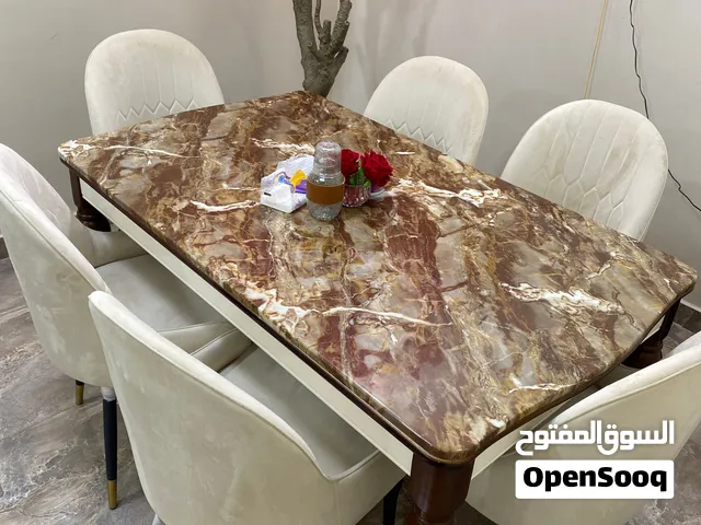 طاولة طعام رخام بني مع 6 كراسي  Brown marble dining table with 6 chairs