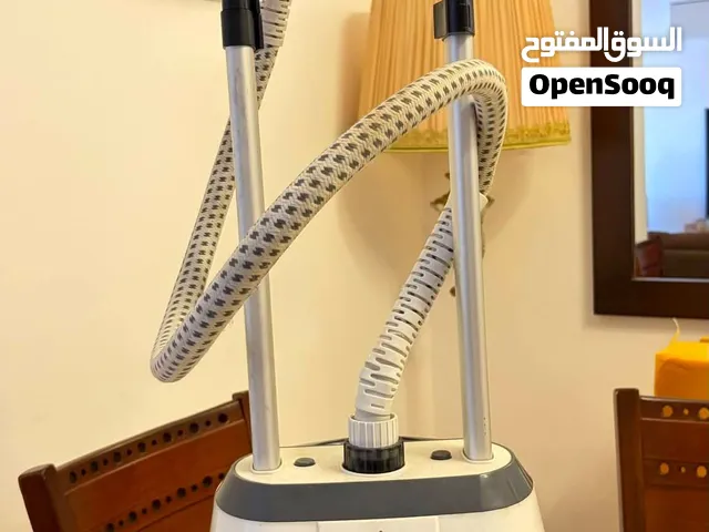 مكوي بخار عامودي
