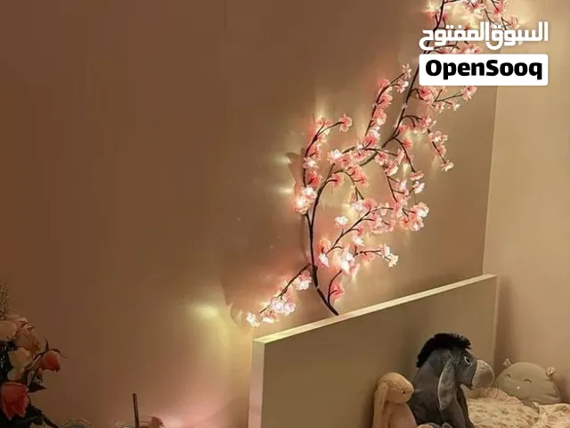 نشره ضوئيه جداريه على شكل شجره ورد
